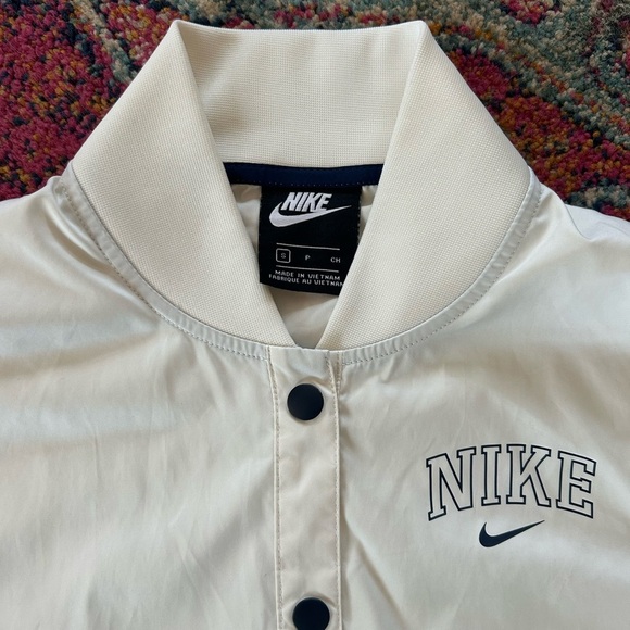 Nike | Women's Cream Snap-Front Varsity Style Jacket side pockets black logos S - Picture 13 of 16